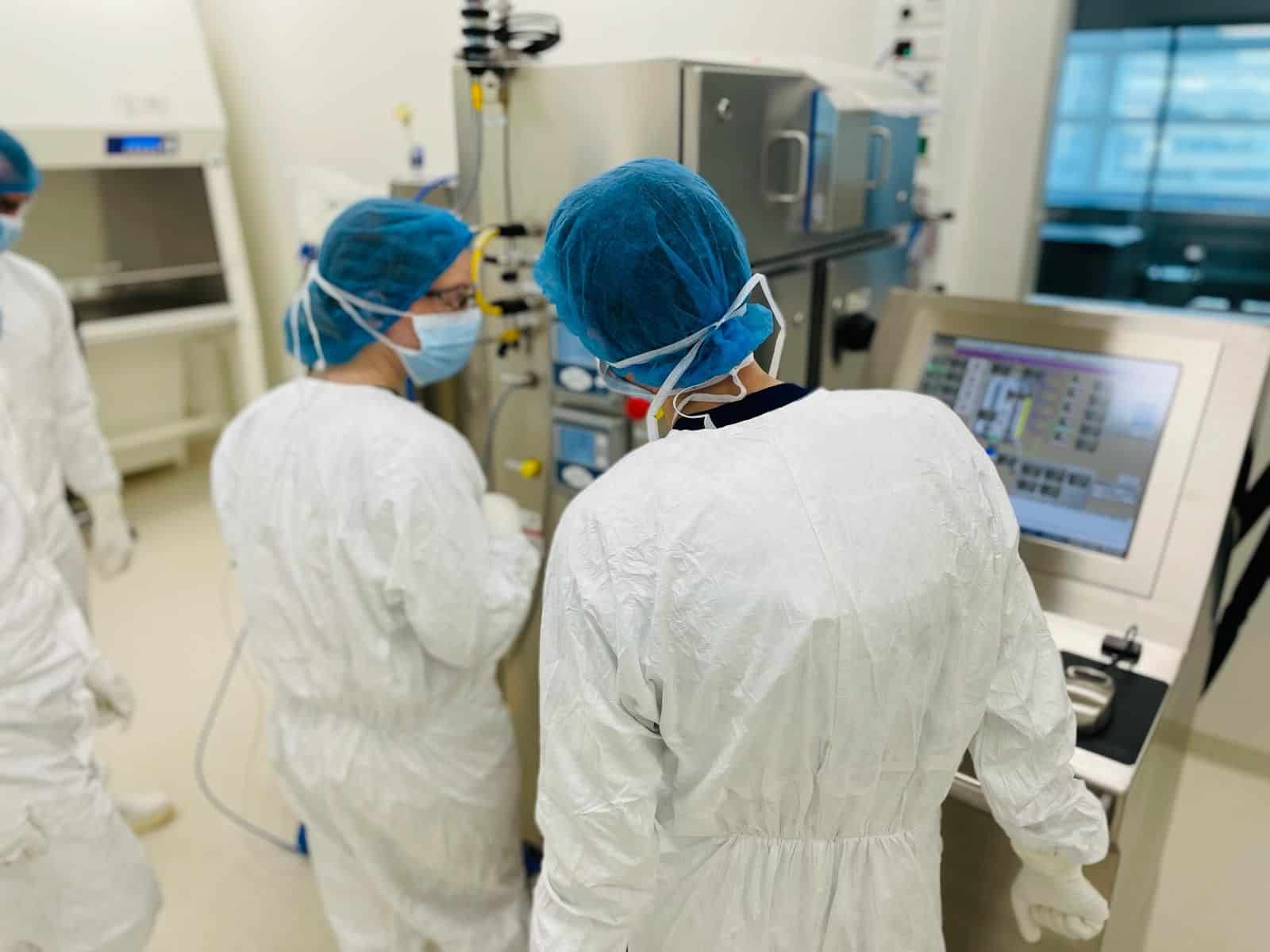 NecstGen Viral Vector colleagues in a clean room